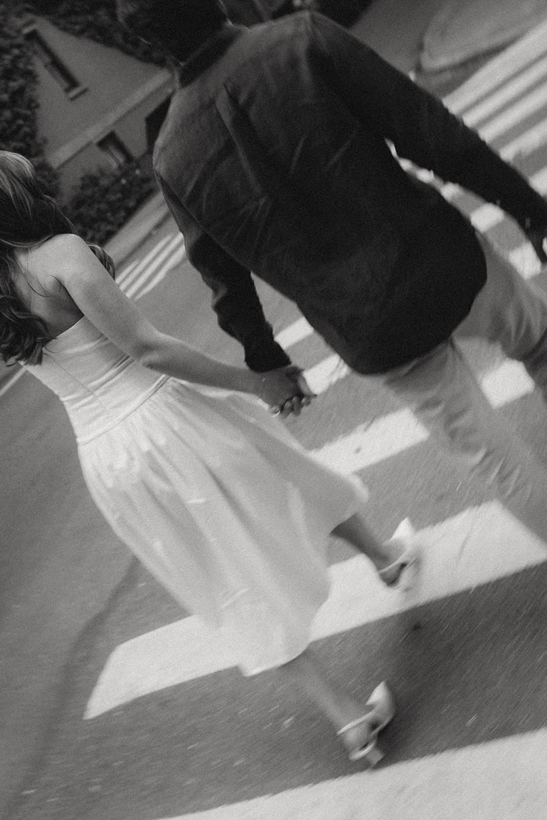 Rachel and Hugh holding hands in New York City